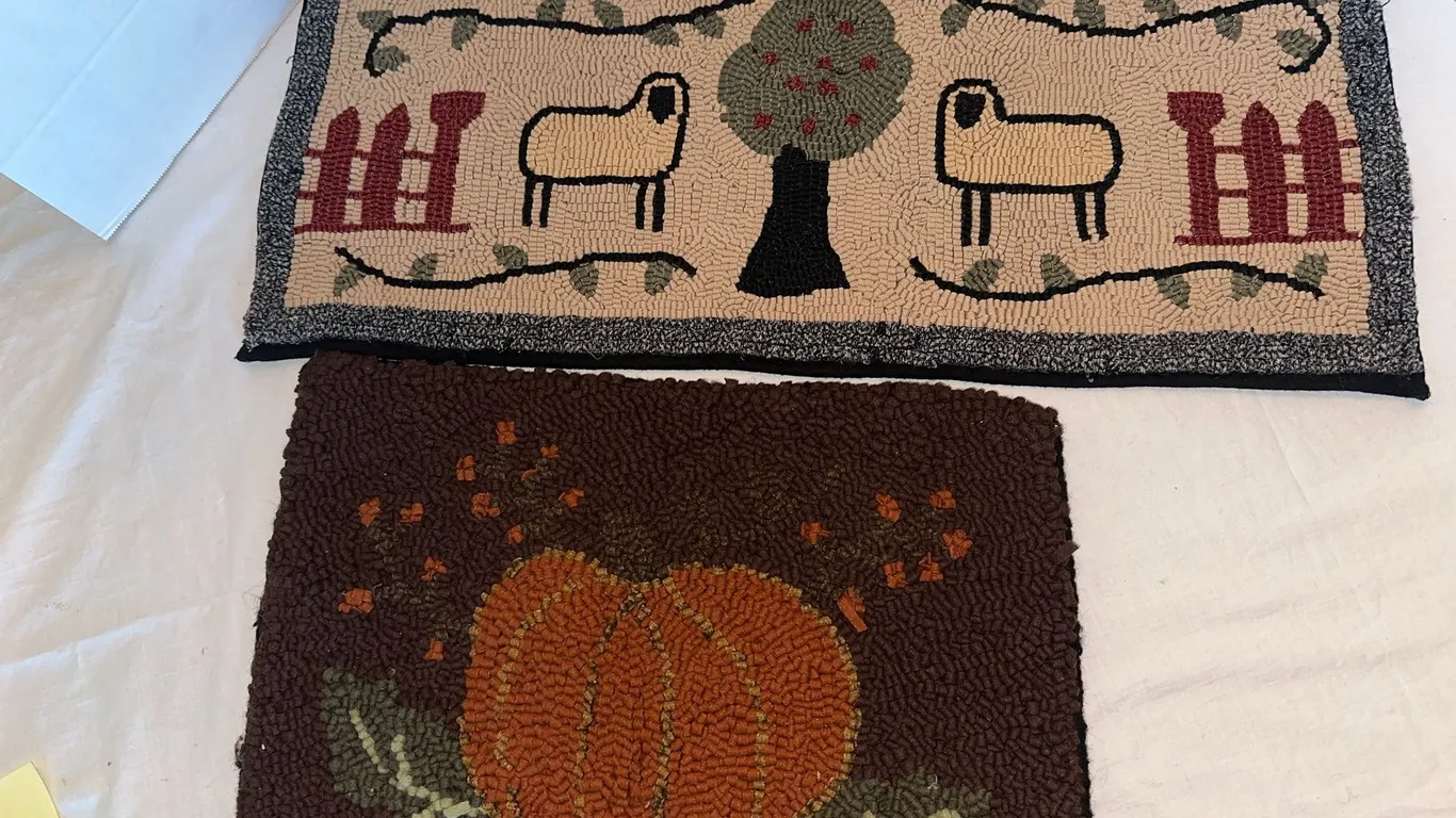 Two primitive hooked mats