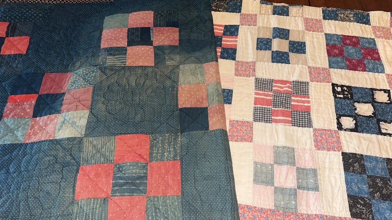 2 vintage hand stitched quilts