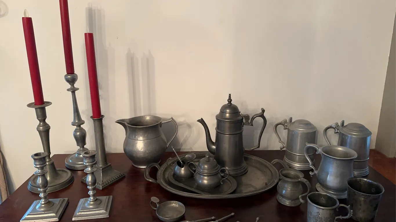 Pewter-steins, pitcher, candlestick holders