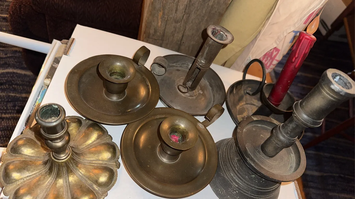 Primitive metal candlesticks holders