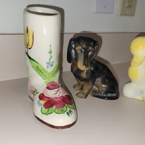vintage hand-painted ceramic boot vase or planter. vintage ceramic or porcelain dachshund figurine.