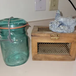 vintage aqua-blue glass "Ball Ideal" canning jar complete with a wire bail closure, glass lid, and r
