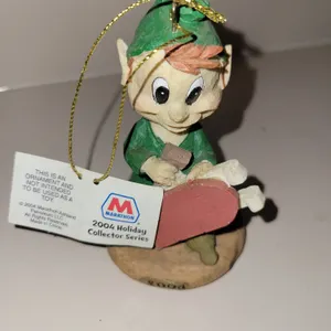 2004 Marathon Oil Elf with Sled Christmas Ornament from the holiday collector series.