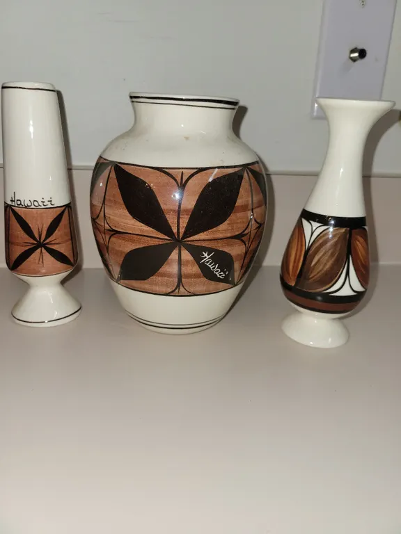 vintage Pohaku Kiln ceramic vases from Hawaii featuring traditional brown and black tapa-style geome