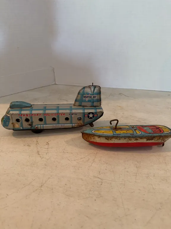 Metal Transport Airplane And Metal Wind Up Boat 8� Long