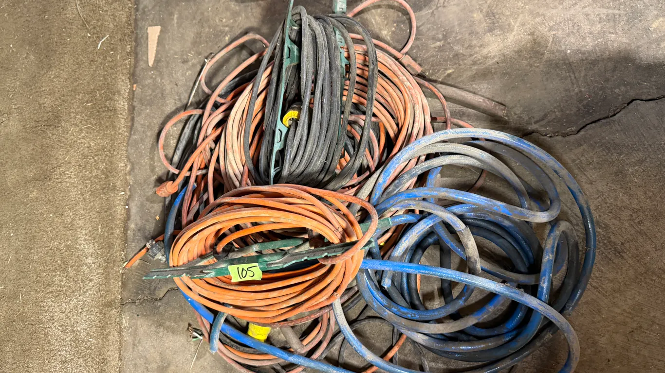 Assorted ext cords and hose