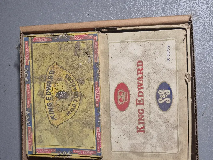 Two cigarette boxes with watches and misc