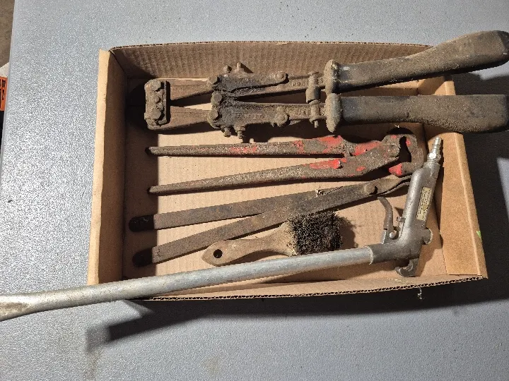 Bolt cutter, pliers, and air nozzle