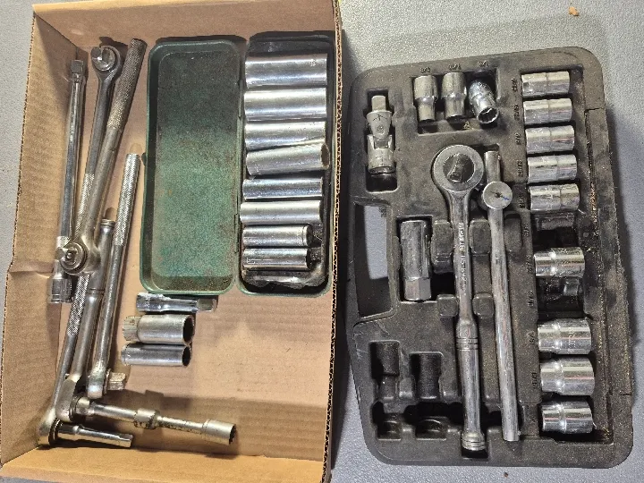 Two socket sets, ratchets, and extensions