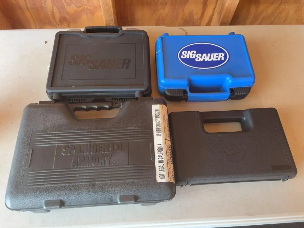 (4) Hard Pistol Cases Including Sig Sauer, Walther w/ P22 Magazine & Springfield Armory