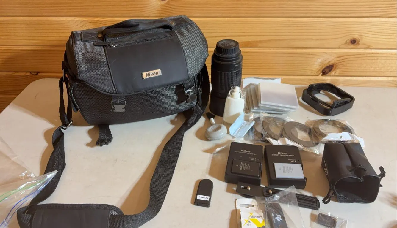 Nikon HB-26 AF Nikkor 70-300mm 1:4-5.6 G Lens, Xit Pro Series High Definition Lens, (2) Nikon Battery Charger w/ Nikon Bag