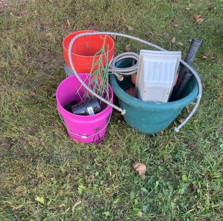 Assortment of Outdoor Items Including Buckets, Planters, Hose & More