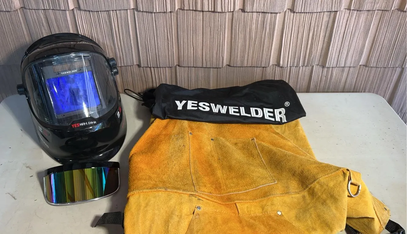 Yes welder helmet and chaps