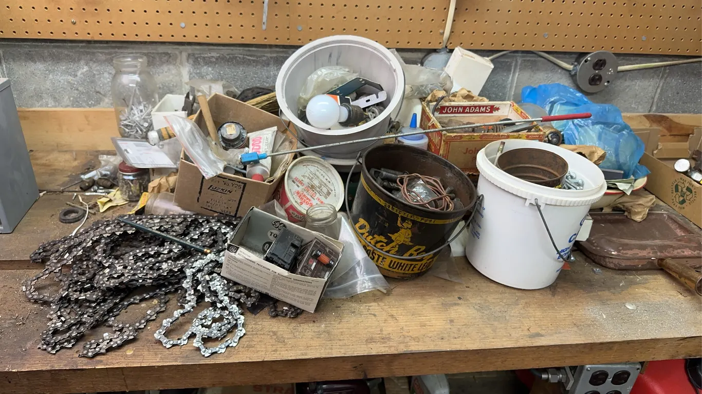 Large lot of hardware including bolts, screws, chainsaw chains & more