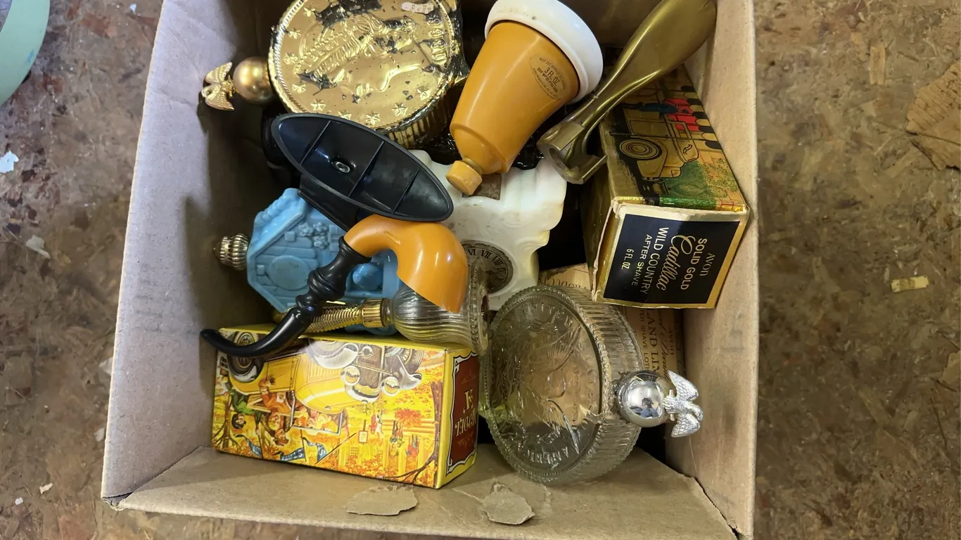 Large lot of Avon perfume bottles