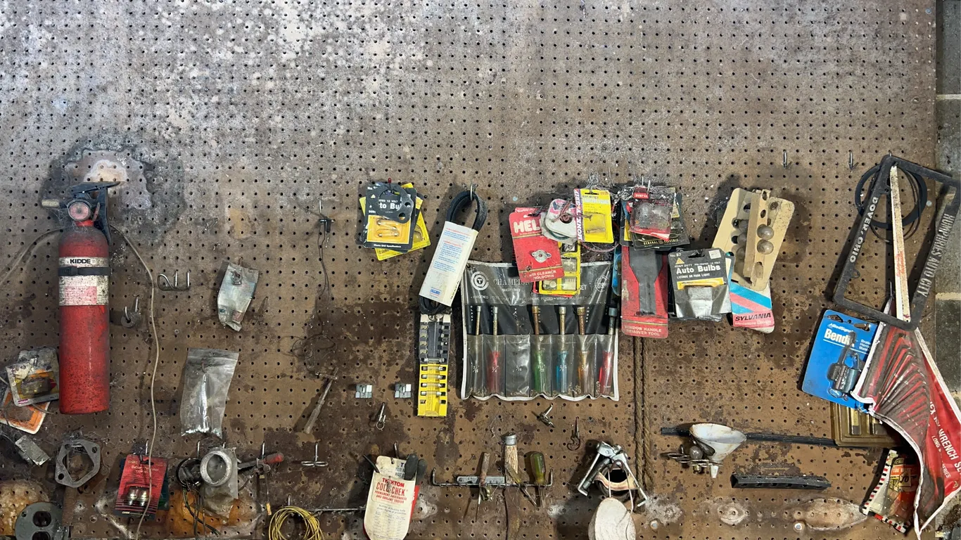 Tools Hanging On Wall Including Buck Knife, Nut Driver Set, Hex Wrench Set & More