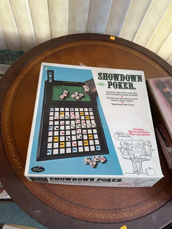 (4)- games including rummikub, uncle wiggly, show down poker & electronic darts game