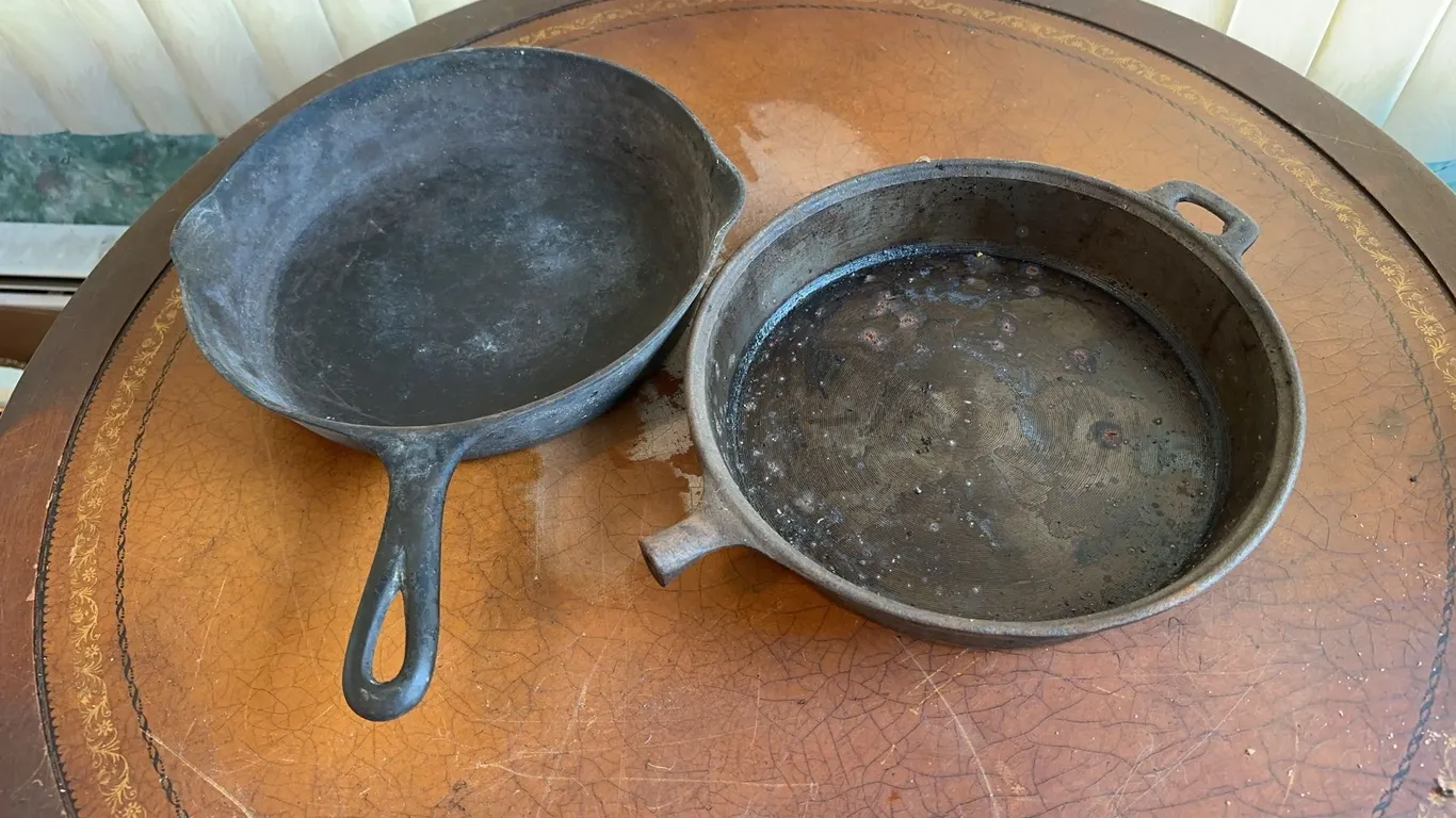(2)- cast iron skillets (1)-Griswold #8 skillet (1)has broken handle