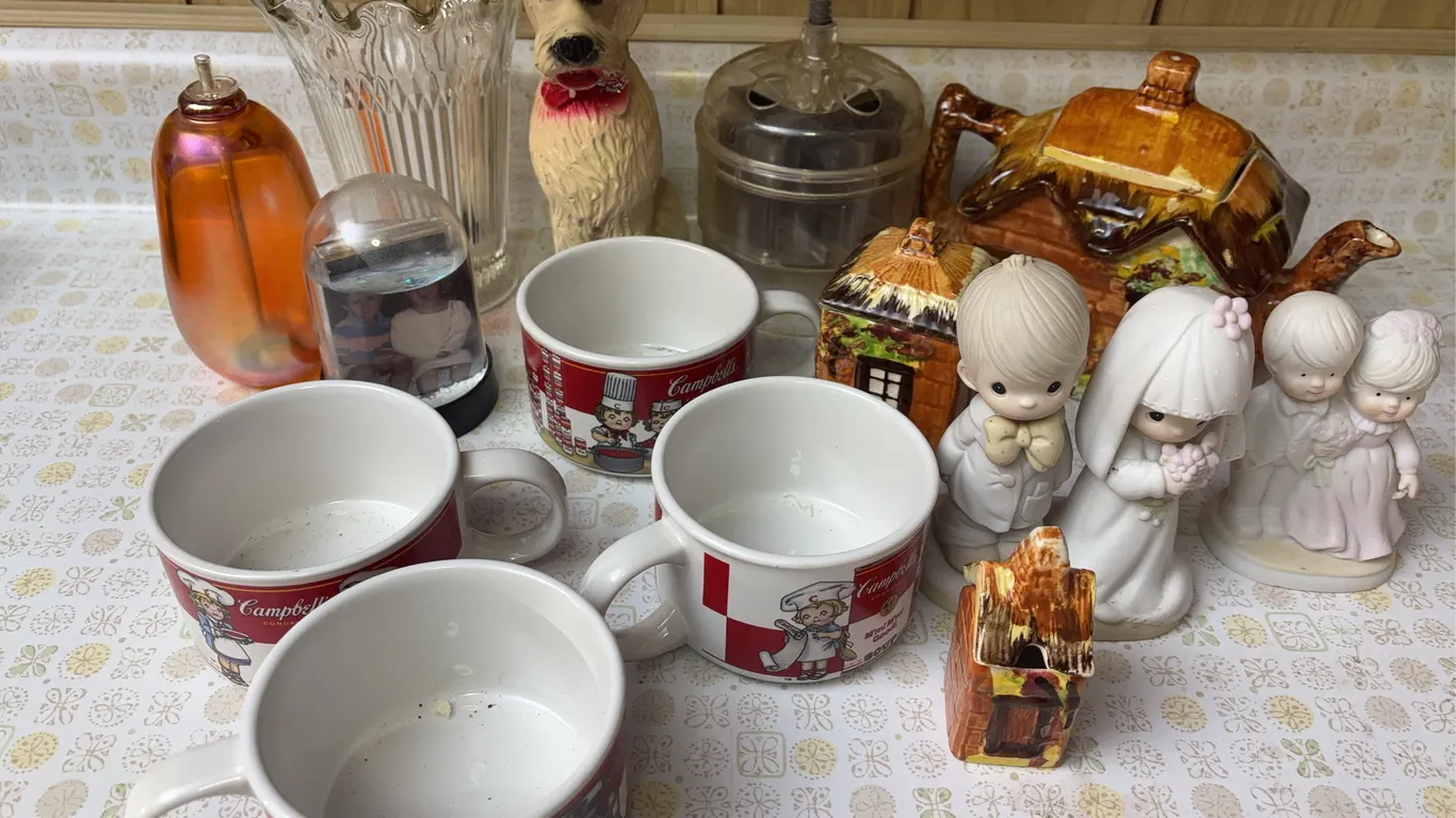 Precious moments figurines, Campbells soup cups & more