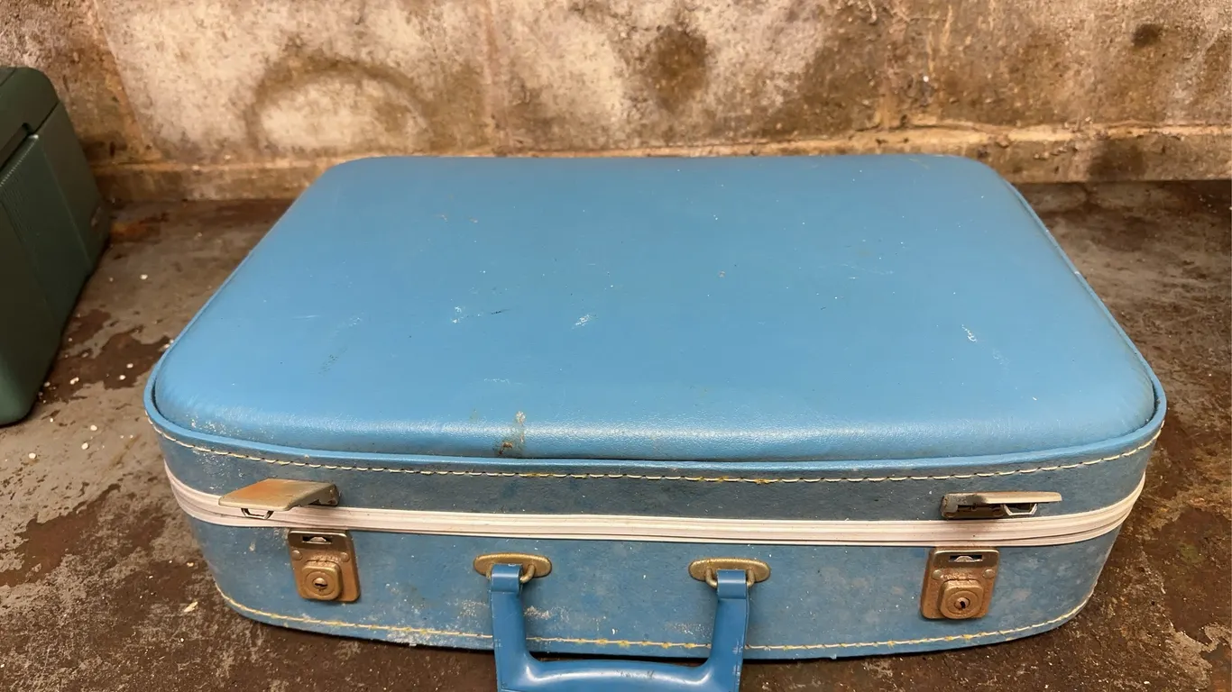 Water cooler, lunch box & suitcase