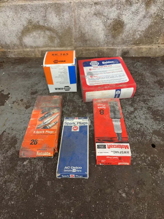 Large lot of spark plugs, gaskets & more