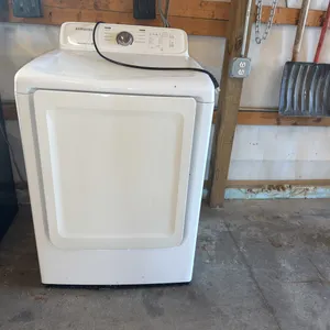 Samsung natural gas dryer, 42"x 26" has some dents