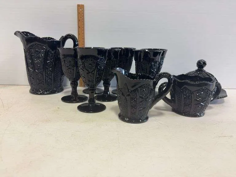 Black Tiara glass pitcher & goblets, sugar & creamer, covered dish