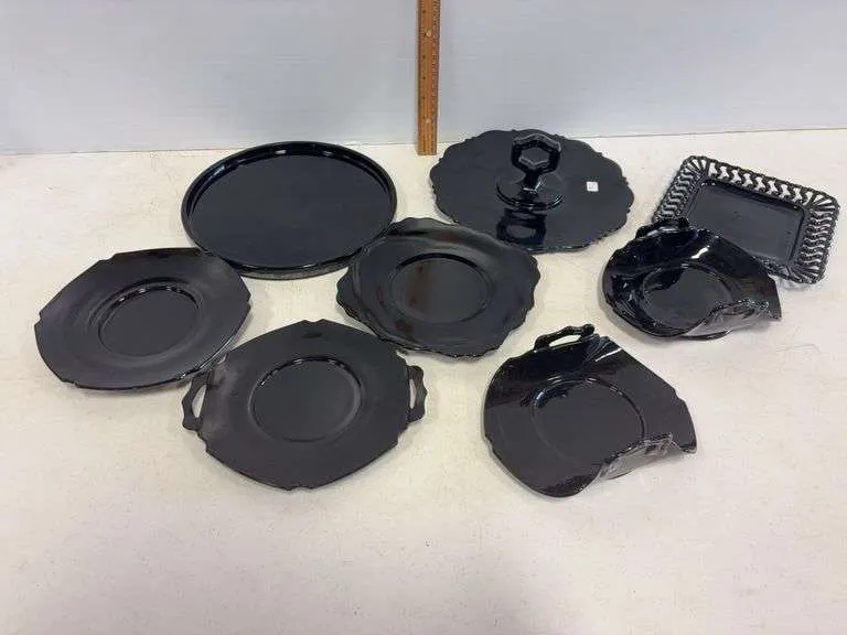 Assortment of black glass trays