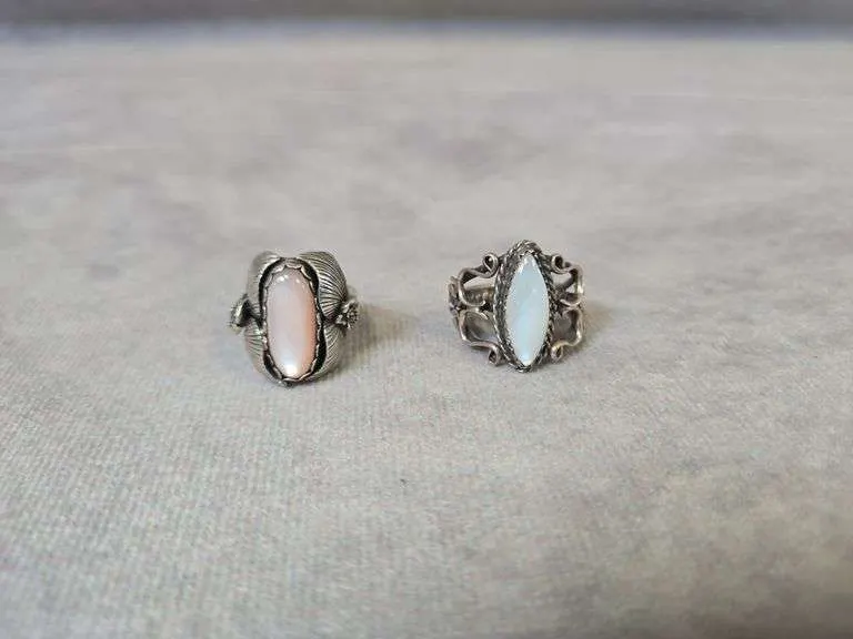 (2) vintage oval rings- (1) marked Sterling