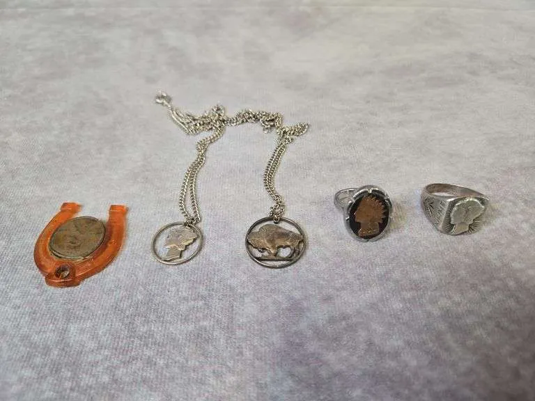 Various coin jewelry pieces