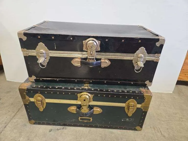 (2) trunks w/ contents- 31"x17"x12"- (1) trunk is locked