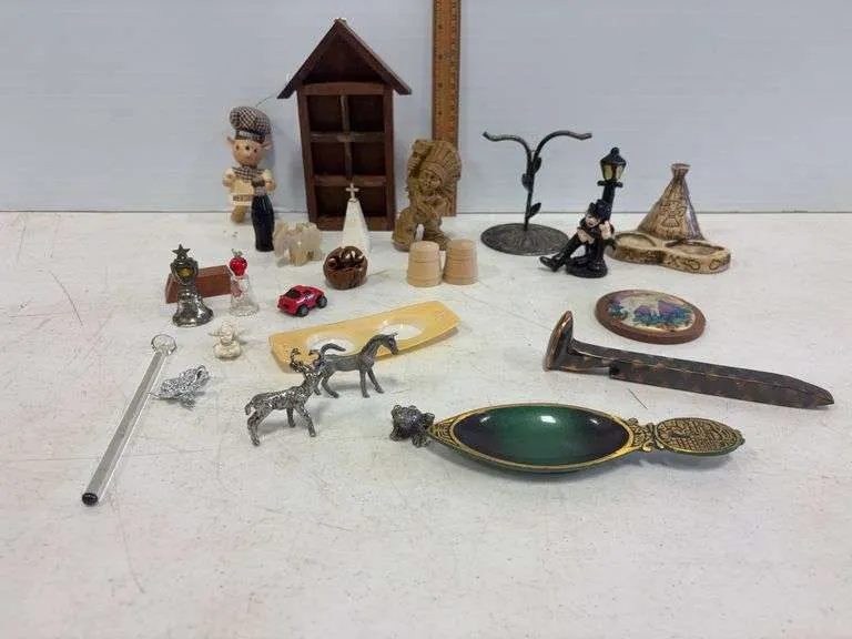 RR spike, cast iron bottle opener, brass trinket tray, figurines, & misc