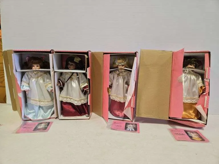 Treasury Collections Paradise Galleries Harmony, Gloria, Melody & Grace porcelain dolls