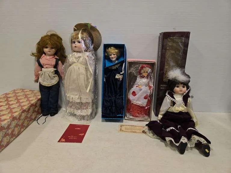 (5) porcelain dolls- includes Princess Dianna & musical calendar February