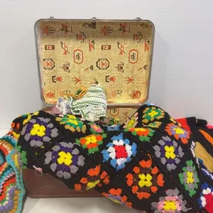 Vintage suitcase w/ Afghans & misc