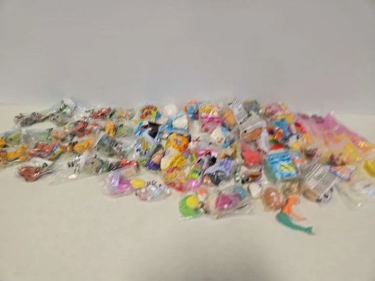 Assortment of McDonald's toys- includes Lion King