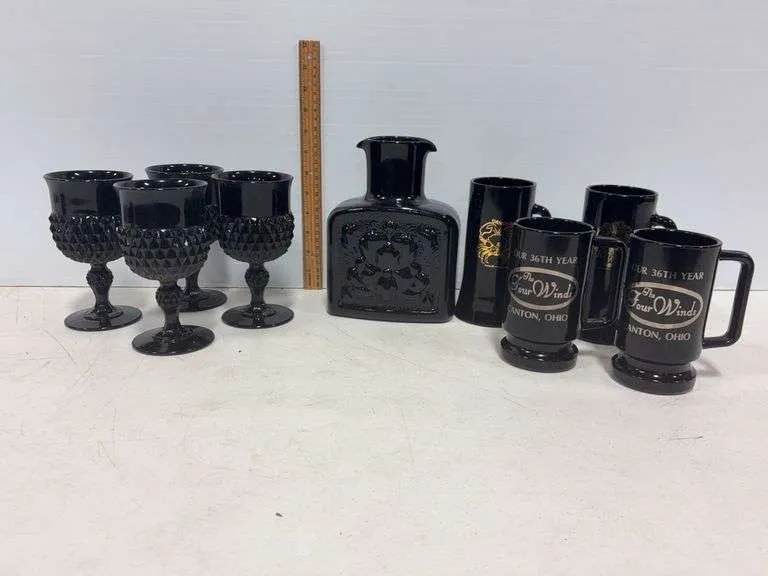 Black pitcher, goblets, & mugs
