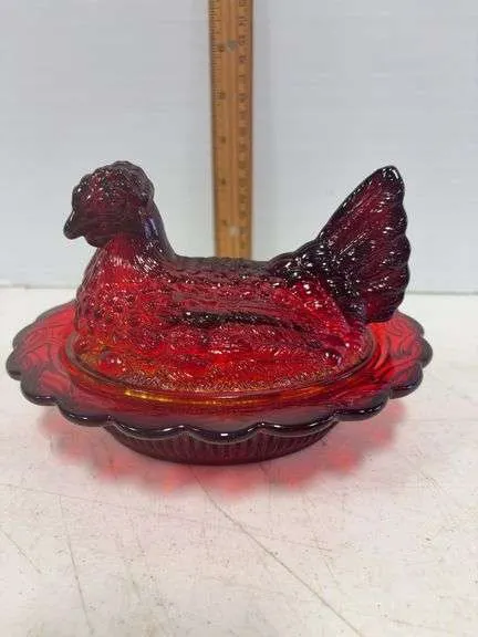 Ruby red hen on a nest- possibly Mosser