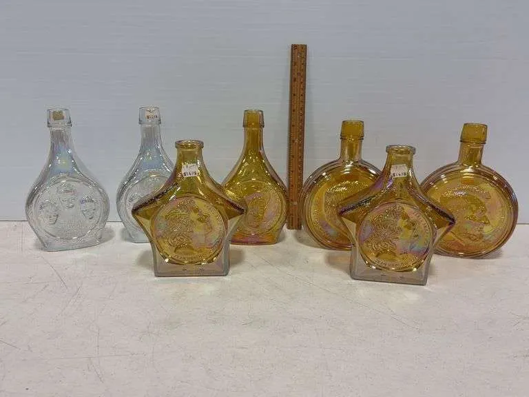 (7) glass decanters- includes Abraham Lincoln, William Penn Rodgers, Jean Harlow & more