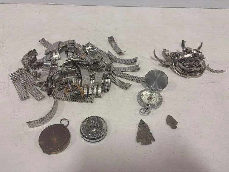 Compasses, arrowheads, watch bands