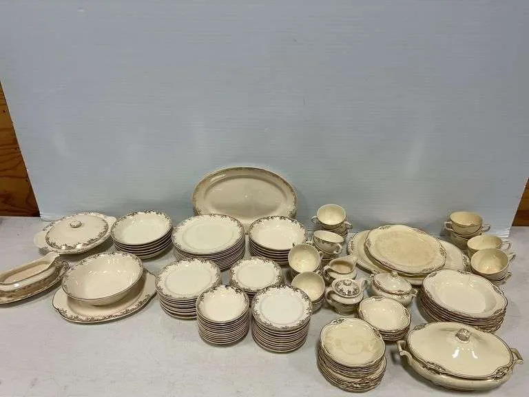 Large qty gold trimmed dishes
