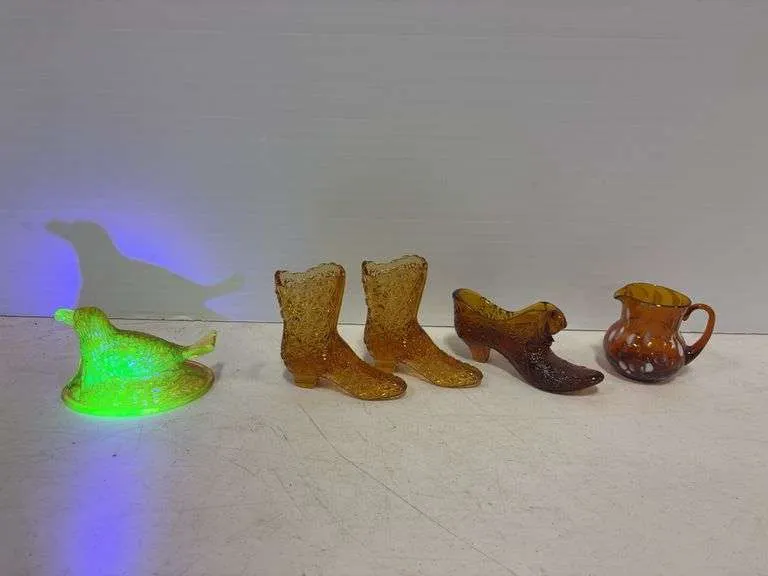 Fenton amber boots, slipper, bird lid-glow, small pitcher