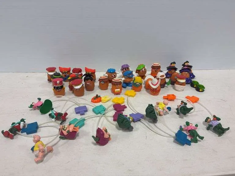 Large assortment of McDonald's toys- mostly McNugget Buddies & Dinosaurs Sinclair Family