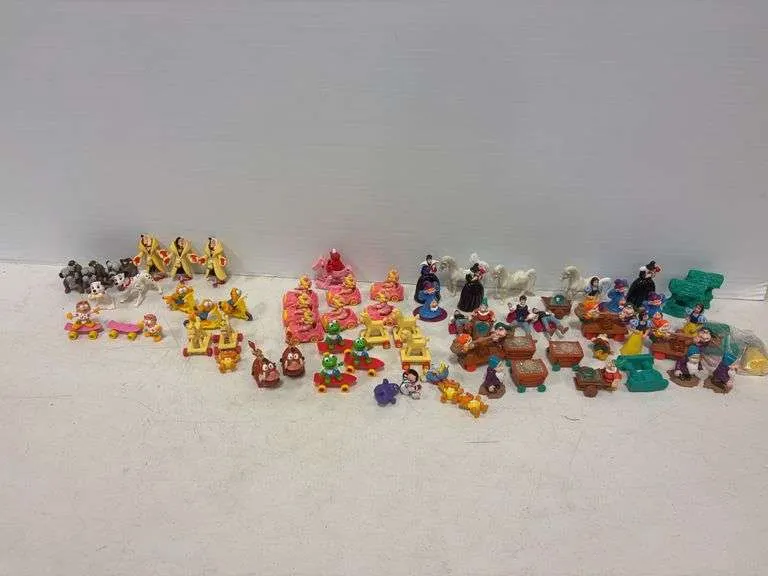 Large assortment of McDonald's toys- includes 1988 Muppet Kid's, Garfield, Snow White, 101 Dalmatians