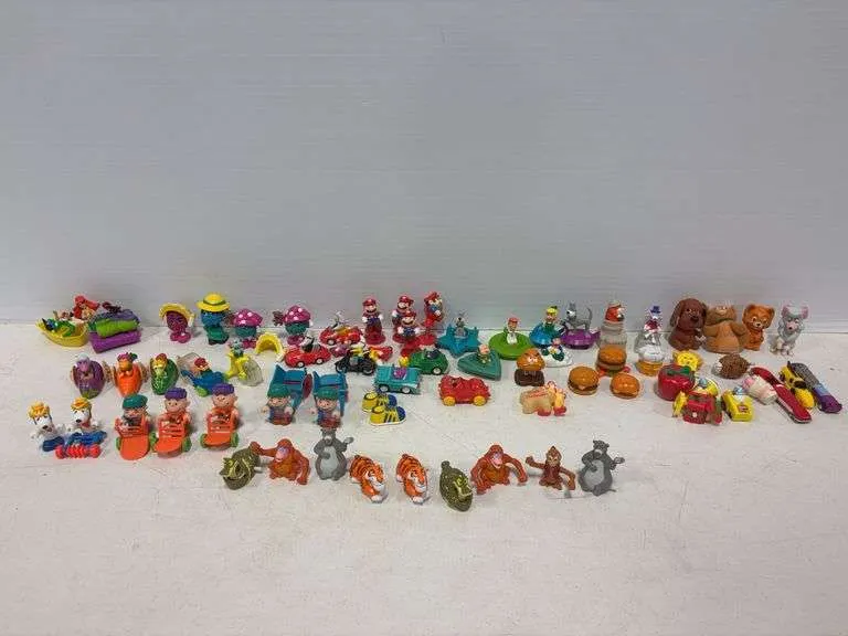 Large assortment of McDonald's toys- includes Peanuts, Mario & Wendy's