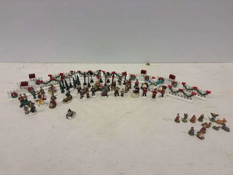 Large assortment of miniature Christmas figurines & train decor