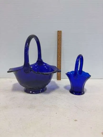 (2) Cobalt blue glass baskets- has crack on side