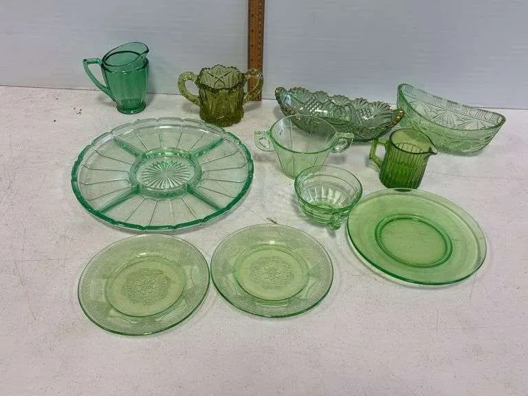 Assortment of green depression glassware