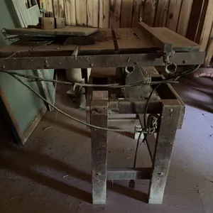 Table saw (has wooden work surface)