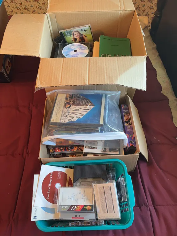 Assorted books, dvds & cassette tapes